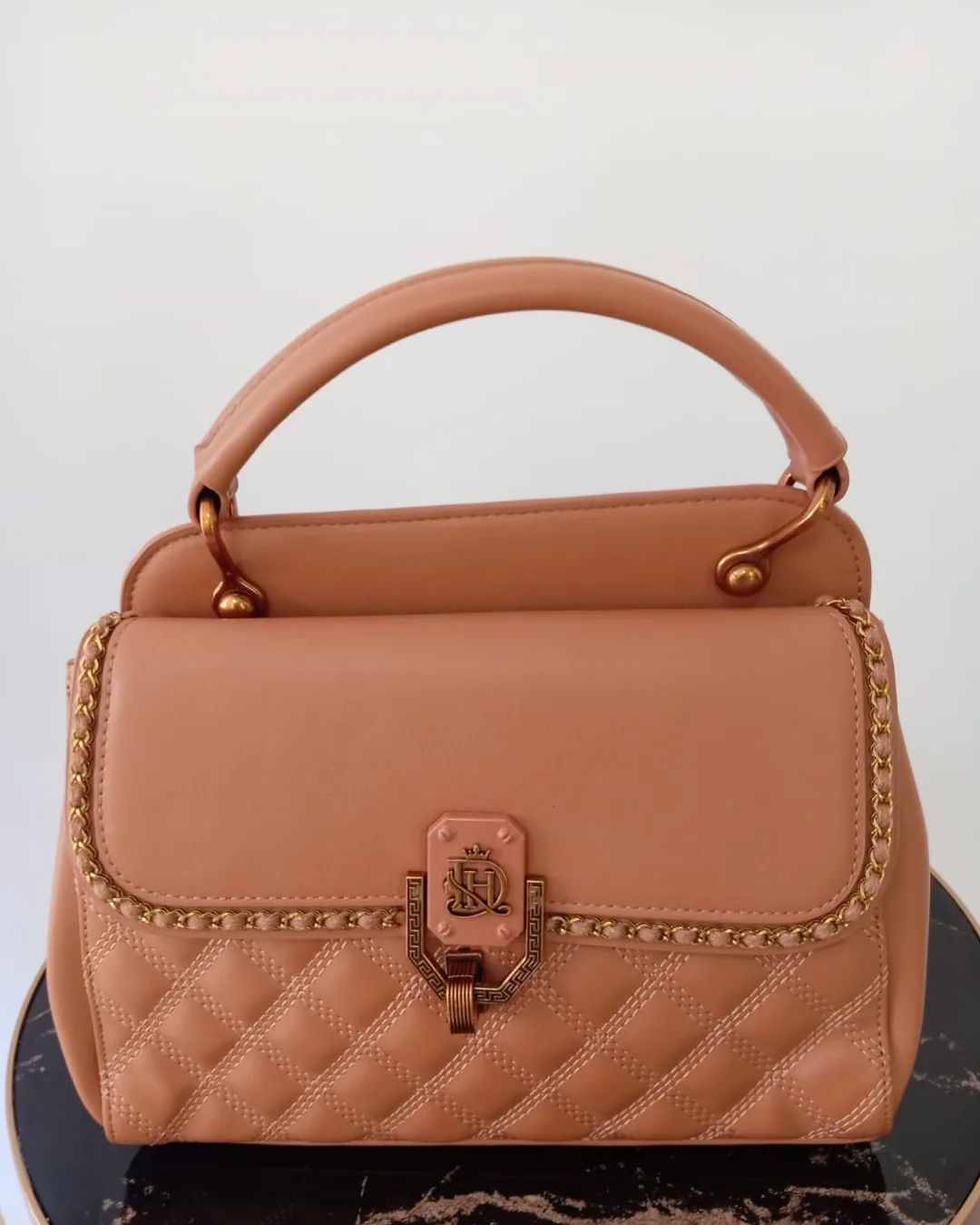 The Studded Bag in Tan, front view
