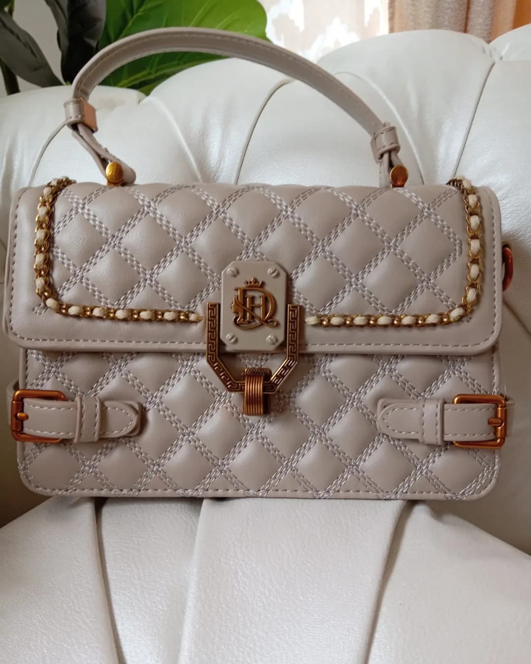 The Buckle Bag in Beige, front view