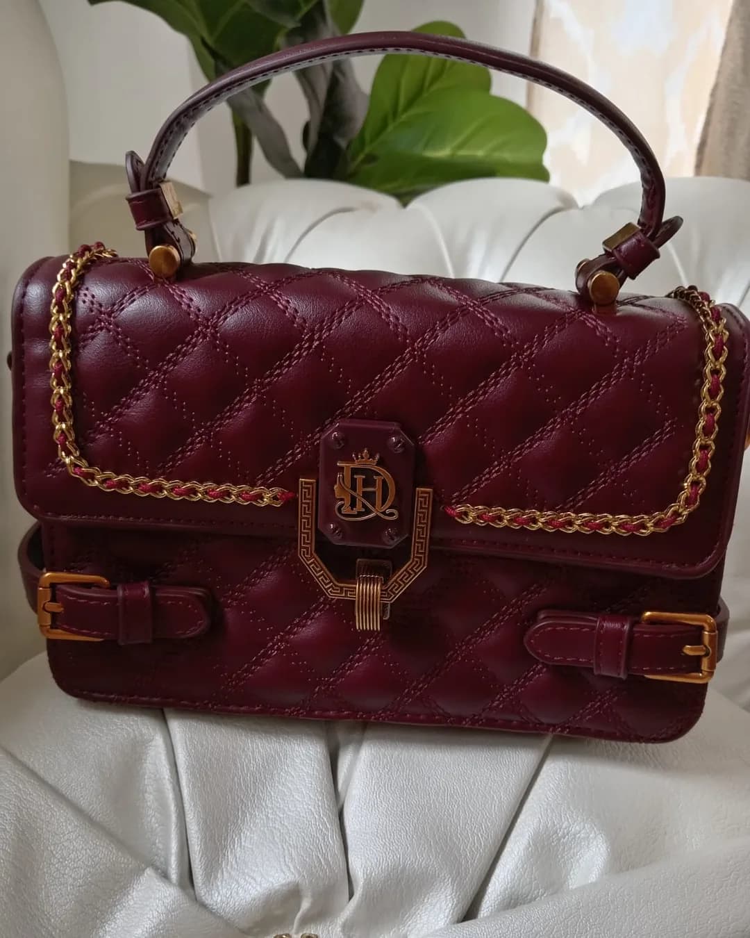 The Buckle Bag in Burgundy, front view