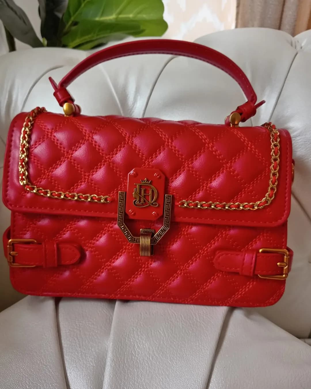 The Buckle Bag in Red, front view