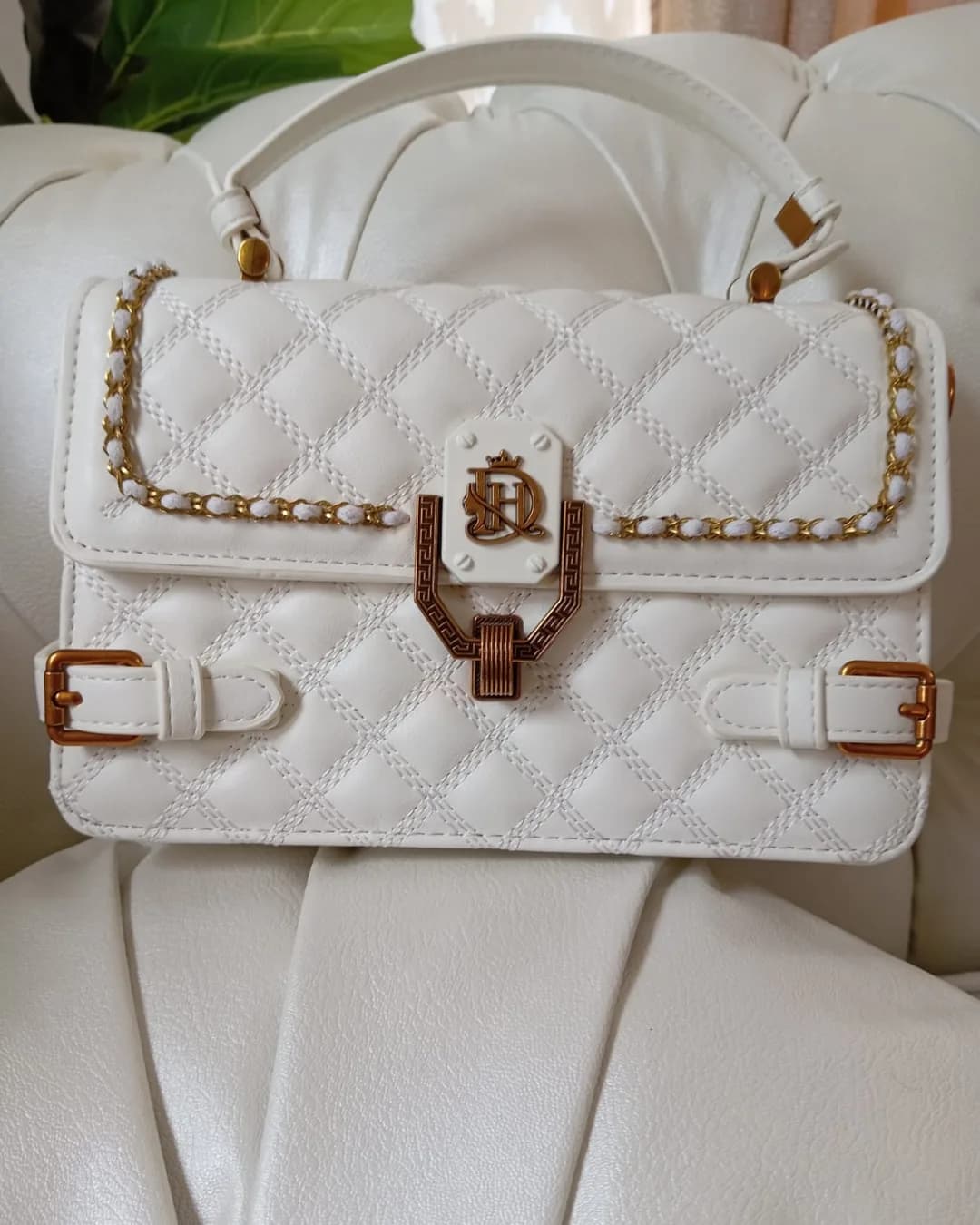 The Buckle Bag in White, front view