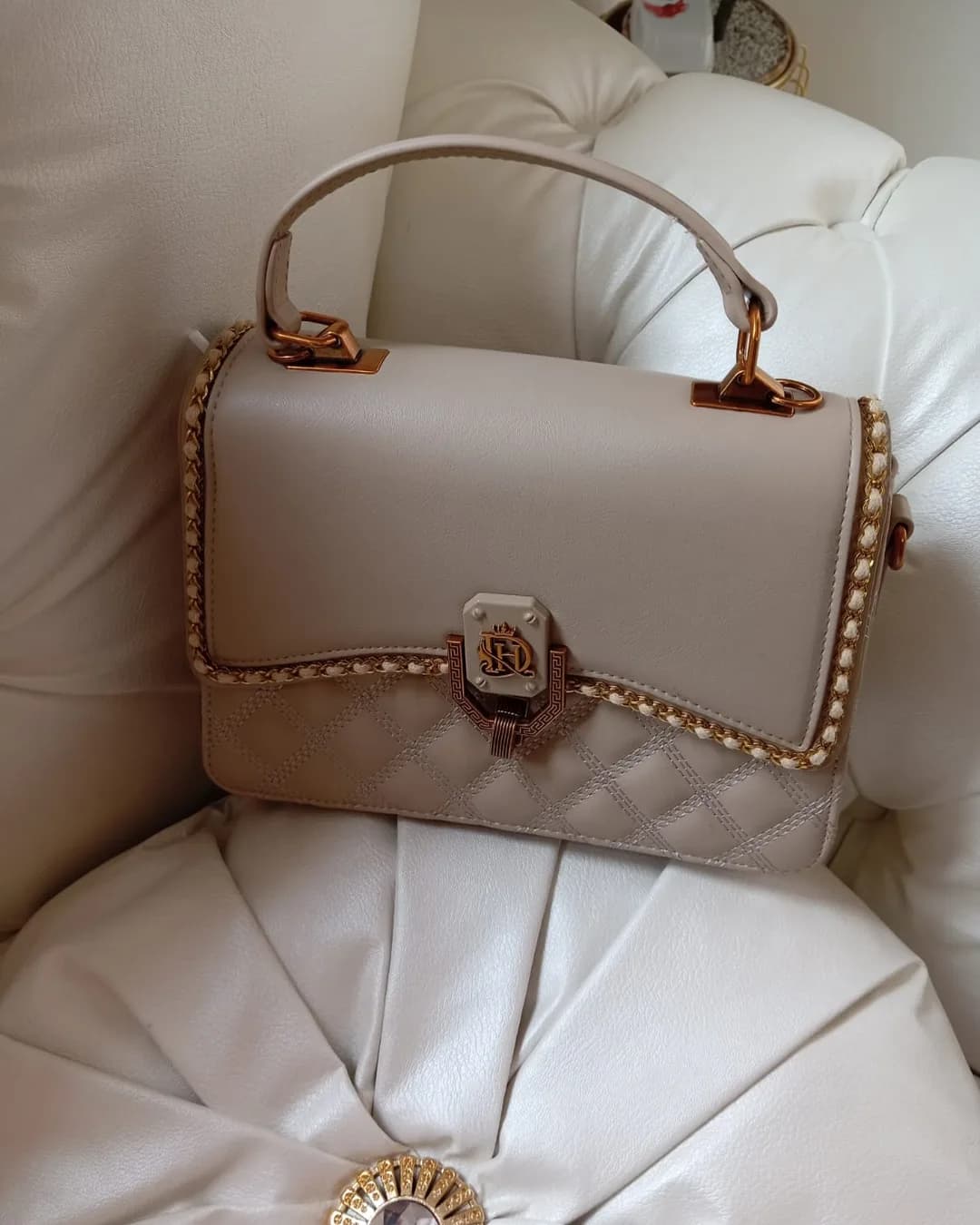 The Chain-Trim Bag in Beige, front view
