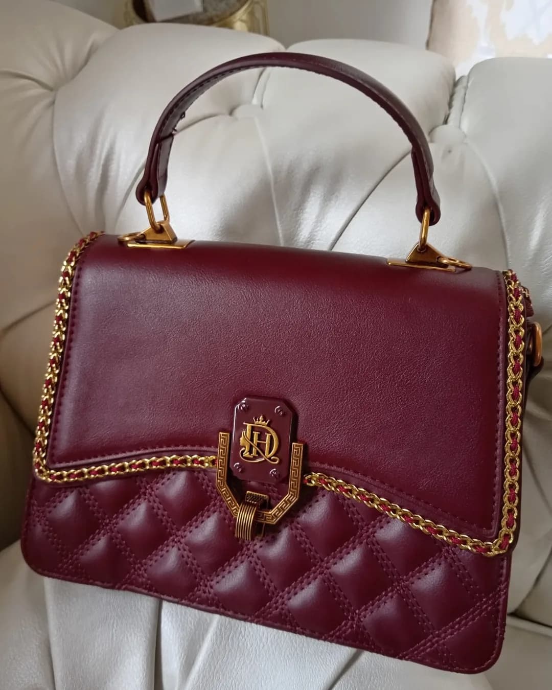 The Chain-Trim Bag in Burgundy, front view